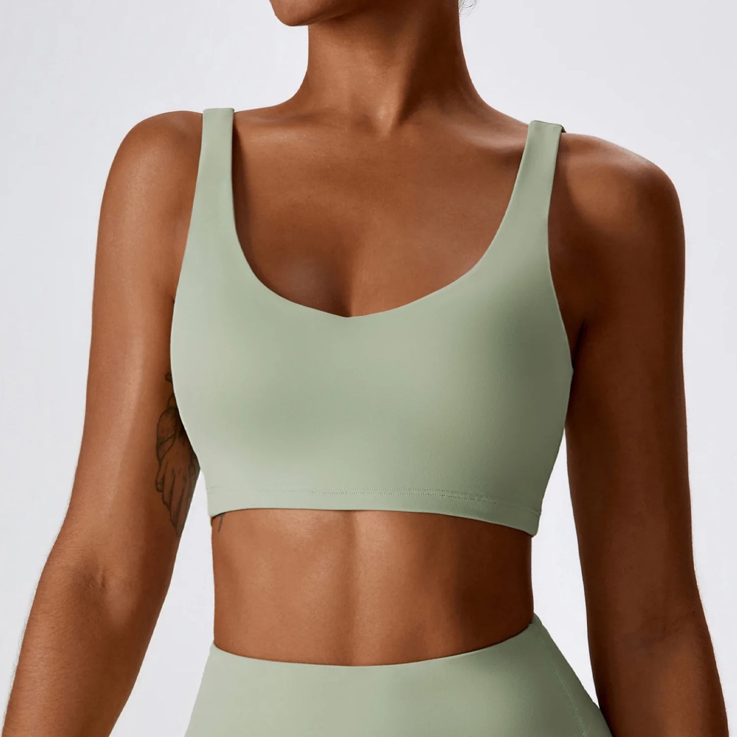 Seamless build in pad crop sport top